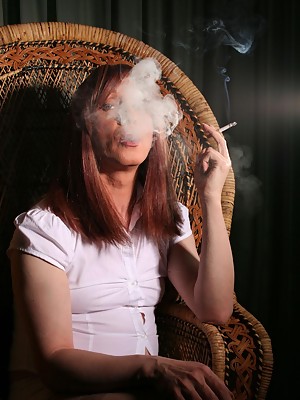 Various shots of sweet Luci May smoking cigarettes and looking alluring.